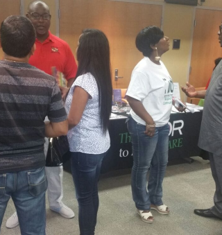 Community members at a health resource fair